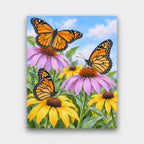 Monarchs on Coneflowers paint by numbers kit of three monarch butterflies on purple coneflowers and black-eyed Susans