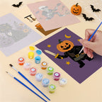 Filling in a Monster Mash mini canvas with numbered acrylic paints and a fine brush