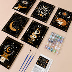 Moon Magic mini paint by numbers kit with six numbered canvases, acrylic paints, brushes and layout