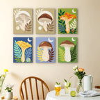 Moon Mushrooms mini paintings displayed as a gallery wall in a sunny kitchen
