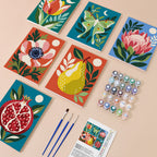 Moonlit Botanicals mini paint by numbers kit with six numbered canvases, acrylic paints, brushes and layout