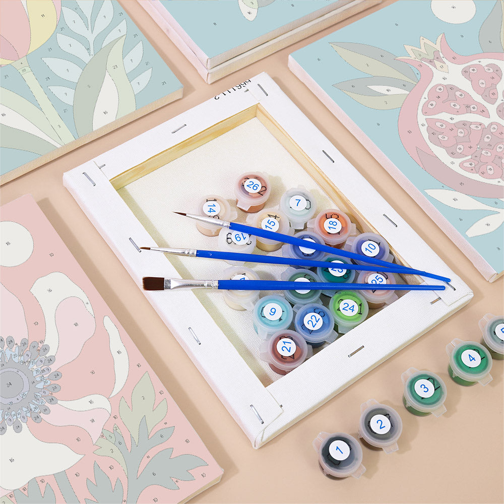 Numbered paint pots and brushes on a pre-stretched Moonlit Botanicals mini canvas