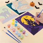 Filling in a Moonlit Halloween mini canvas with numbered acrylic paints and a fine brush