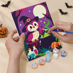 Numbered paint pots and brushes on a pre-stretched Moonlit Monster Meadows mini canvas