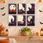 Painting a Moonlit Silhouettes mini canvas propped up beside numbered acrylic paints