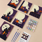 Painting one of the Moonlit Silhouettes designs next to a stack of mini canvases