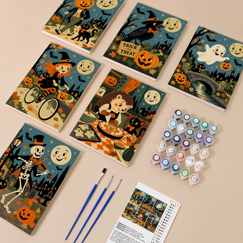 Painting one of the Moonlit Storybook Halloween designs next to a stack of mini canvases
