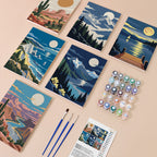 Moonlit Wilderness mini paint by numbers kit with six numbered canvases, acrylic paints, brushes and layout