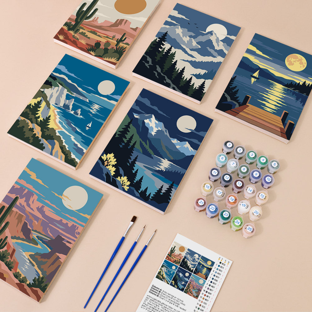 Moonlit Wilderness mini paint by numbers kit with six numbered canvases, acrylic paints, brushes and layout