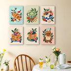 Morning Treats mini paintings displayed as a gallery wall in a sunny kitchen