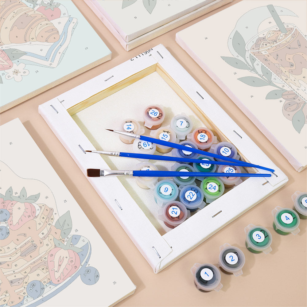 Numbered paint pots and brushes on a pre-stretched Morning Treats mini canvas