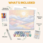 What's included in the Mosaic of Mountains paint by numbers kit: numbered linen canvas, reference sheet, color guide, 24 acrylic paints, 3 brushes and thank you card