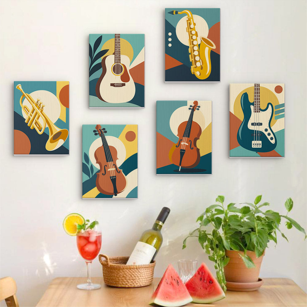 Six finished Music Makers mini paintings hung on a wall above a table