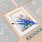 Numbered paint pots and brushes on a pre-stretched Mystic Folk mini canvas