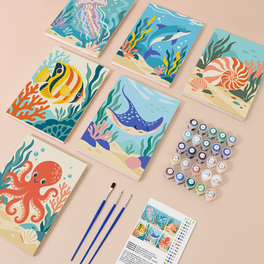 Ocean Friends mini paint by numbers kit with six numbered canvases, acrylic paints, brushes and layout
