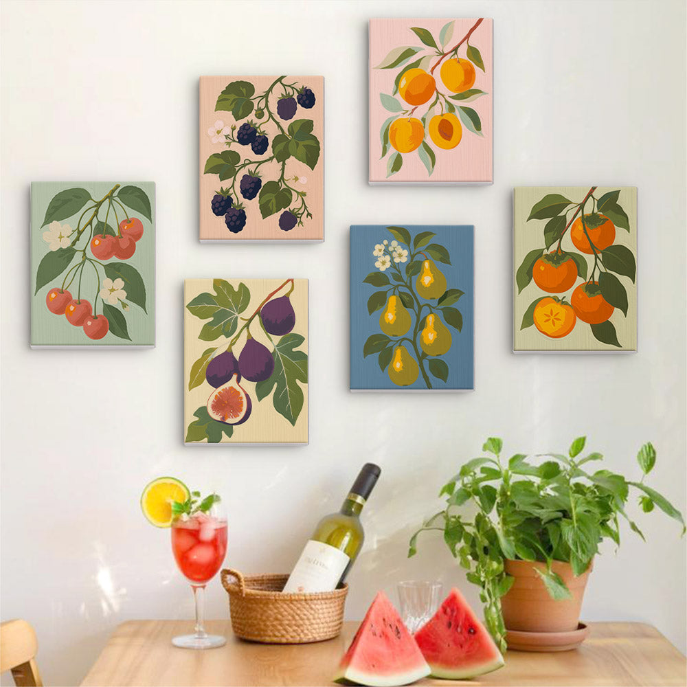 Six finished Orchard Harvest mini paintings hung on a wall above a table