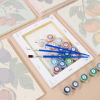 Numbered paint pots and brushes on a pre-stretched Orchard Harvest mini canvas