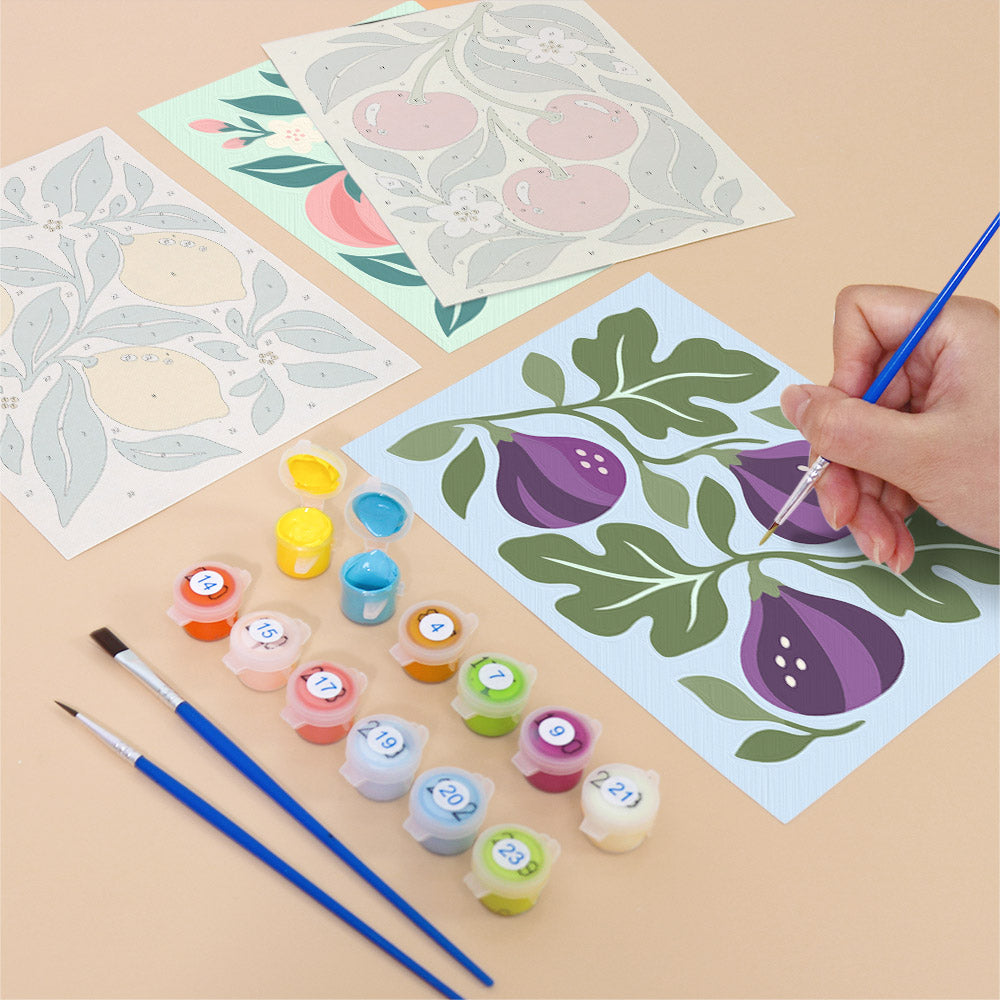 Filling in an Orchard Prints mini canvas with numbered acrylic paints and a fine brush