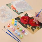 Filling in a Painterly Blooms mini canvas with numbered acrylic paints and a fine brush