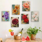 Six finished Painterly Blooms mini paintings hung on a wall above a table