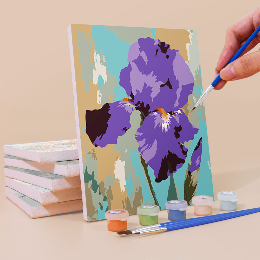 Painting a Painterly Blooms mini canvas propped up beside numbered acrylic paints