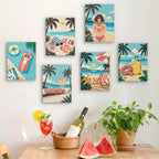 Six finished Palm Beach Holiday mini paintings hung on a wall above a table