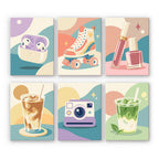 Pastel Favorites mini paint by numbers set: six pastel designs of earbuds, a roller skate, makeup, iced drinks and a camera