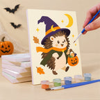 Painting a Pastel Halloween Pals mini canvas propped up beside numbered acrylic paints