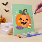 Painting a Pastel Kawaii Icons mini canvas propped up beside numbered acrylic paints