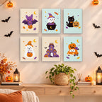 Pastel Pumpkin Pals mini paintings displayed as a gallery wall in a sunny kitchen