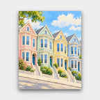 Pastel Row Houses paint by numbers kit of a row of pink, mint, yellow and blue Victorian row houses on a sloping street