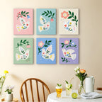 Peace Doves mini paintings displayed as a gallery wall in a sunny kitchen