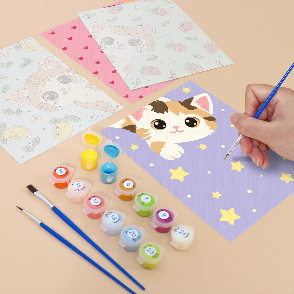 Filling in a Peekaboo Kittens mini canvas with numbered acrylic paints and a fine brush
