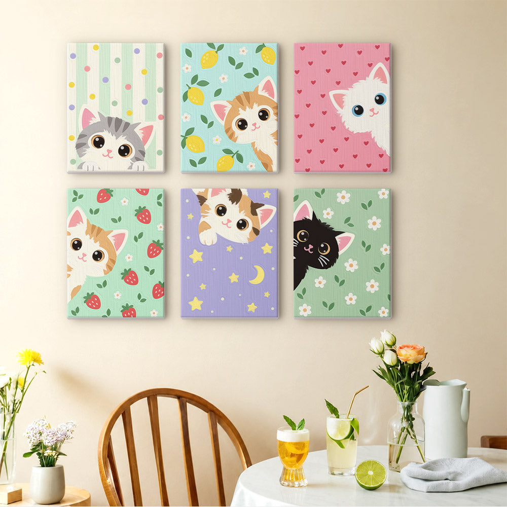 Peekaboo Kittens mini paintings displayed as a gallery wall in a sunny kitchen