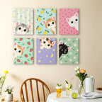 Peekaboo Kittens mini paintings displayed as a gallery wall in a sunny kitchen