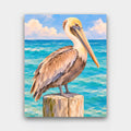 Pelican on the Post paint by numbers kit of a brown pelican perched on a weathered pier post over turquoise water