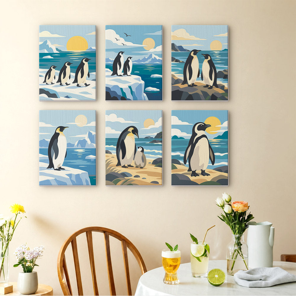 Penguin Shores mini paintings displayed as a gallery wall in a sunny kitchen