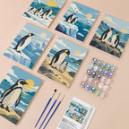 Penguin Shores mini paint by numbers kit with six numbered canvases, acrylic paints, brushes and layout