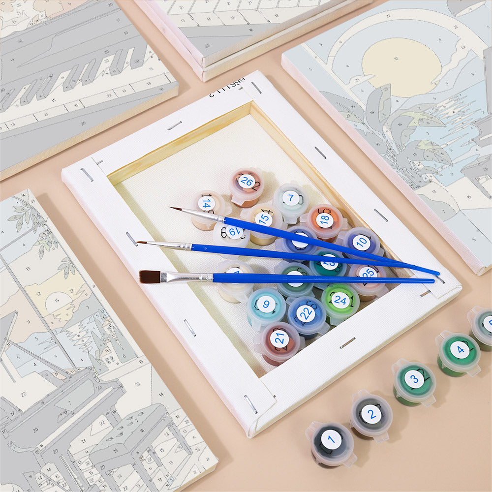 Numbered paint pots and brushes on a pre-stretched Piano Moments mini canvas