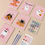 Pink Boo Crew mini paint by numbers kit with six numbered canvases, acrylic paints, brushes and layout