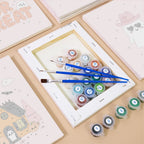 Numbered paint pots and brushes on a pre-stretched Pink Boo Crew mini canvas