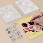 Painting one of the Pink Glam designs next to a stack of mini canvases