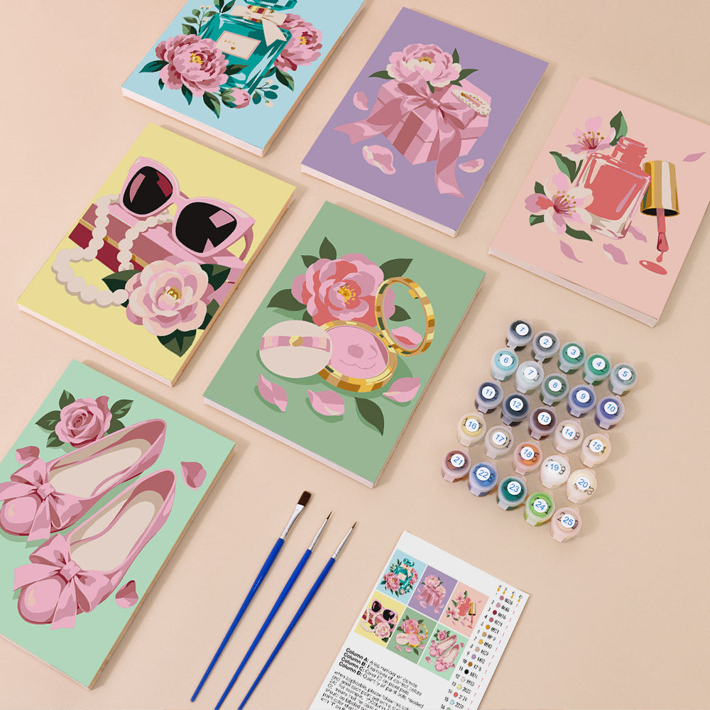 Pink Glam mini paint by numbers kit with six numbered canvases, acrylic paints, brushes and layout