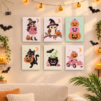 Six finished Pink Pumpkin Party mini paintings hung on a wall above a table