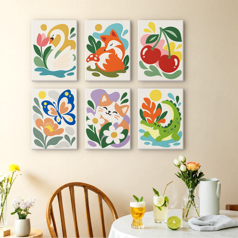 Playful Garden mini paintings displayed as a gallery wall in a sunny kitchen