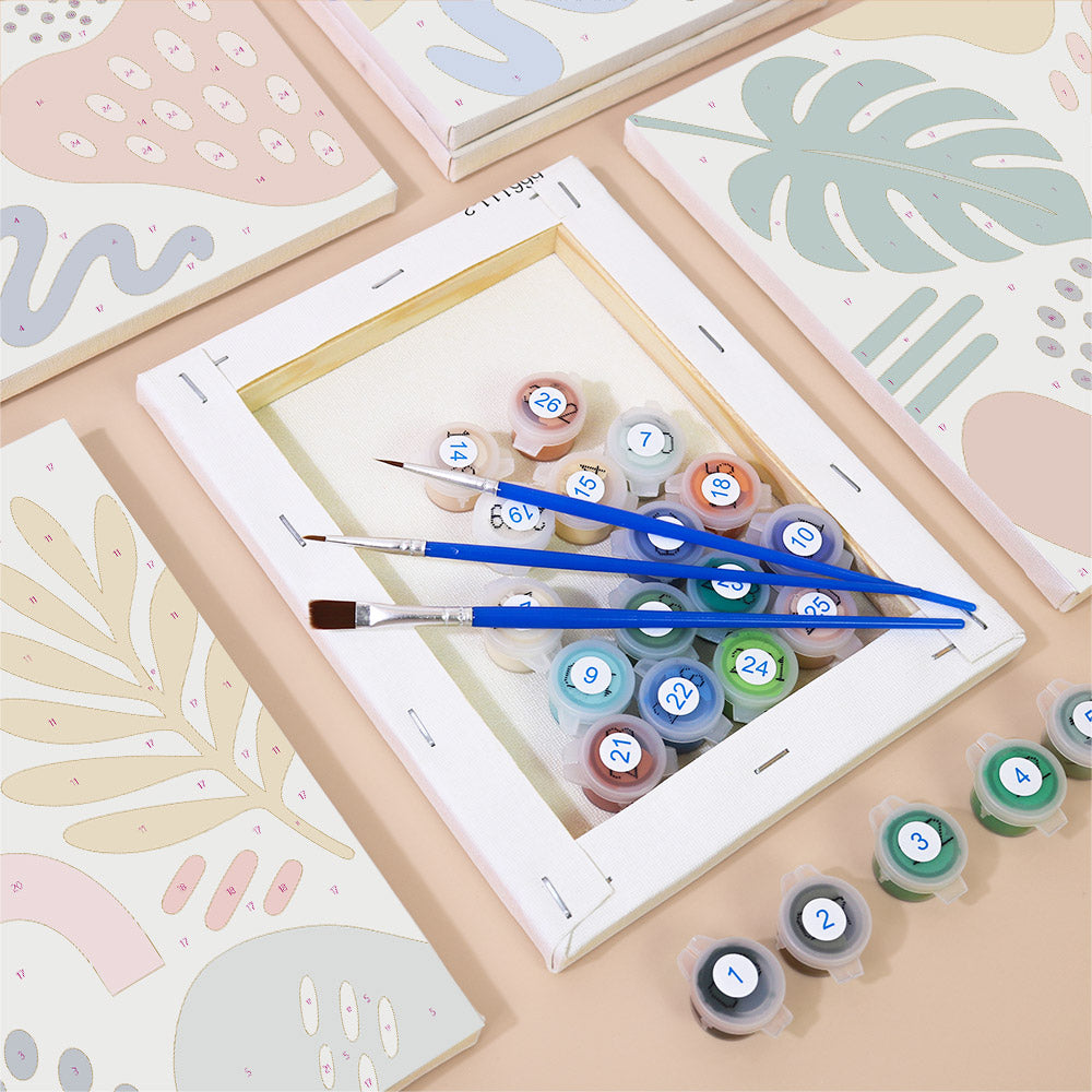 Numbered paint pots and brushes on a pre-stretched Playful Shapes mini canvas
