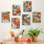 Six finished Pomegranate Kitchen mini paintings hung on a wall above a table