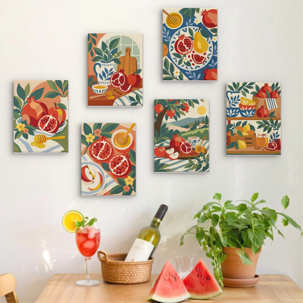 Six finished Pomegranate Kitchen mini paintings hung on a wall above a table