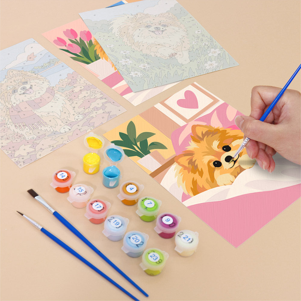 Filling in a Pomeranian Days mini canvas with numbered acrylic paints and a fine brush