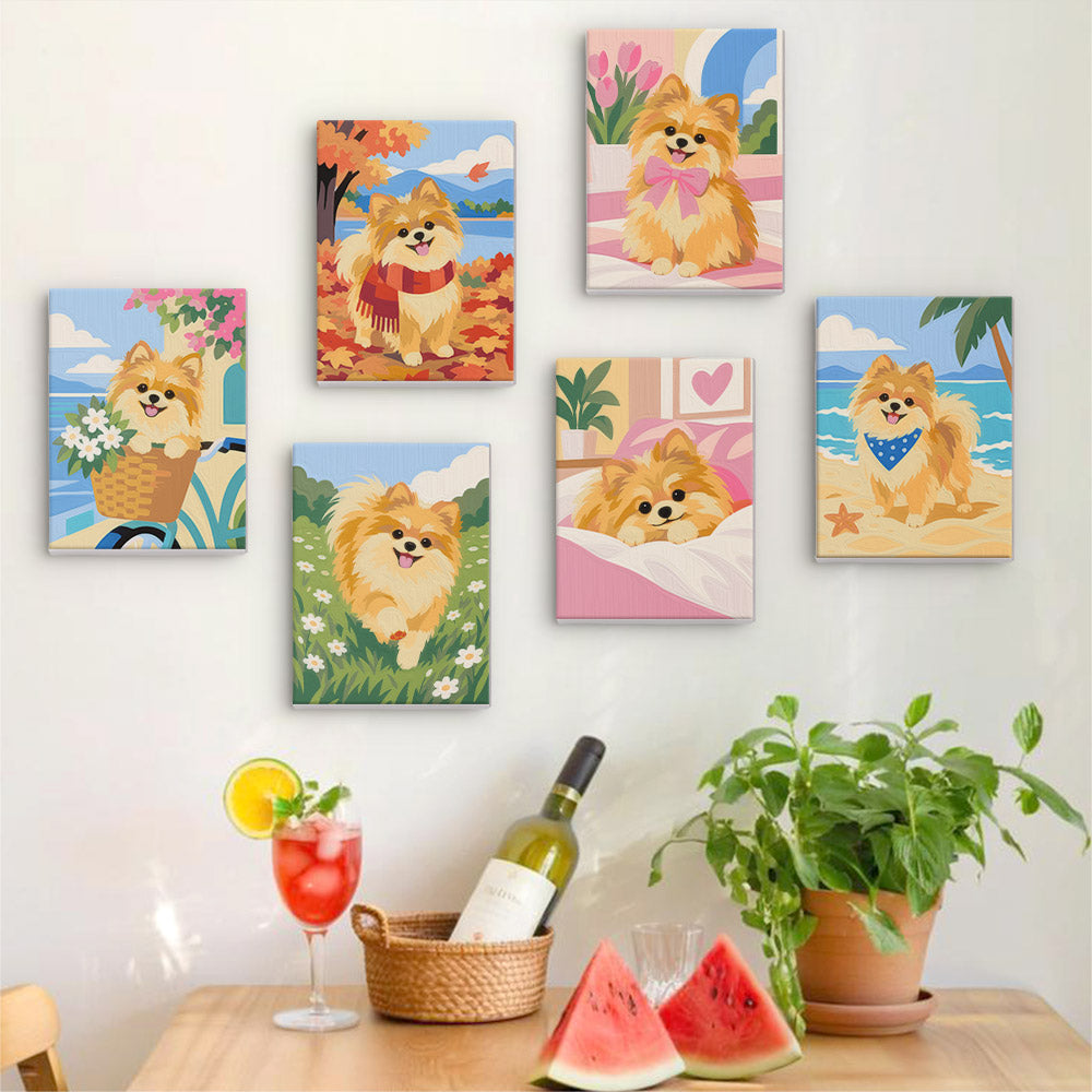Six finished Pomeranian Days mini paintings hung on a wall above a table